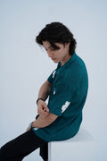 Daisy Patch Shirt - side seated pose