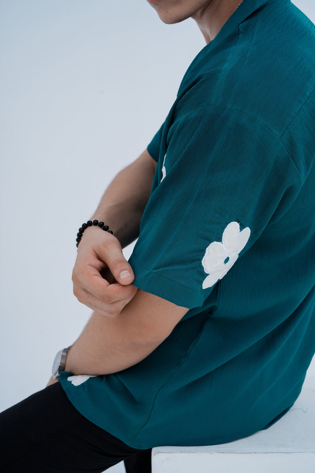 Daisy Patch Shirt - sleeve patch detail
