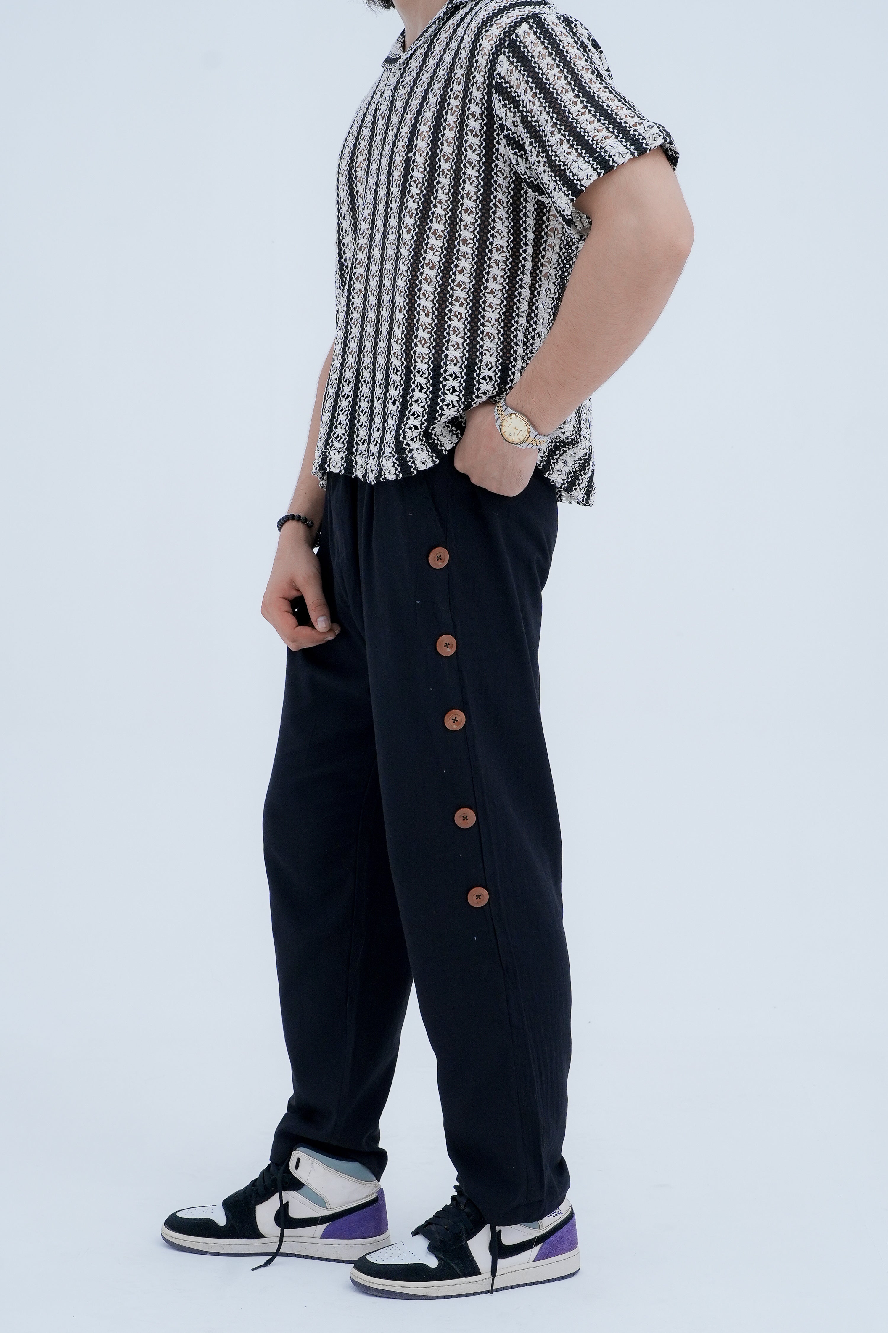 Snap Side Trousers in Black - side button detail