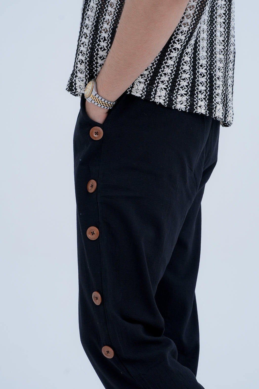 Snap Side Trousers in Black - button close up