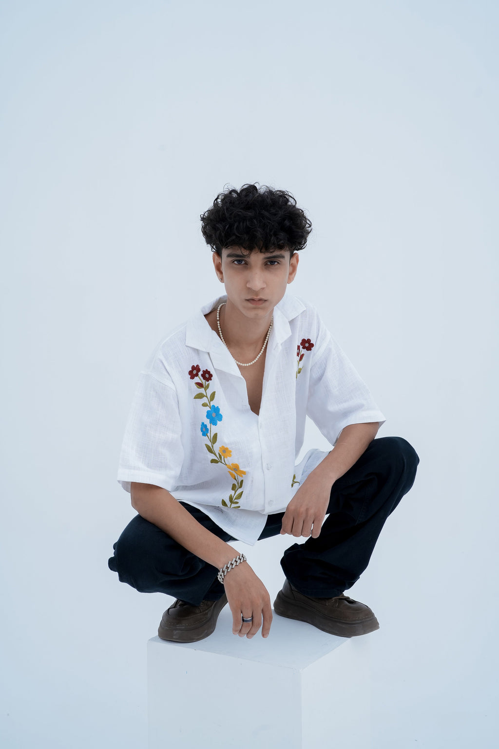 Wildflower Embroidered Shirt - seated pose