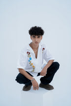Wildflower Embroidered Shirt - seated pose