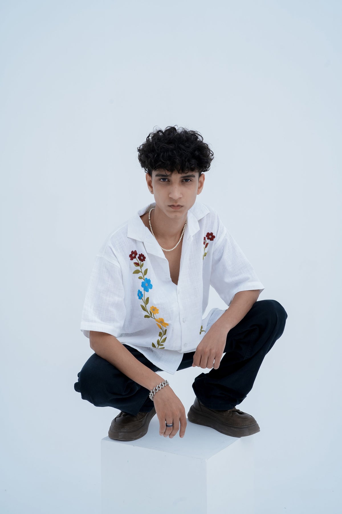 Wildflower Embroidered Shirt - seated pose