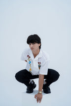 Wildflower Embroidered Shirt - crouched pose