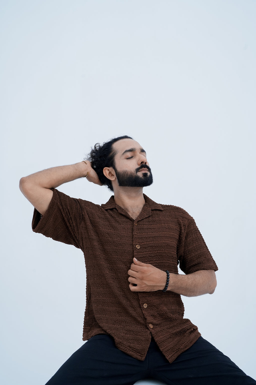 Ember Knit Camp Shirt - seated pose