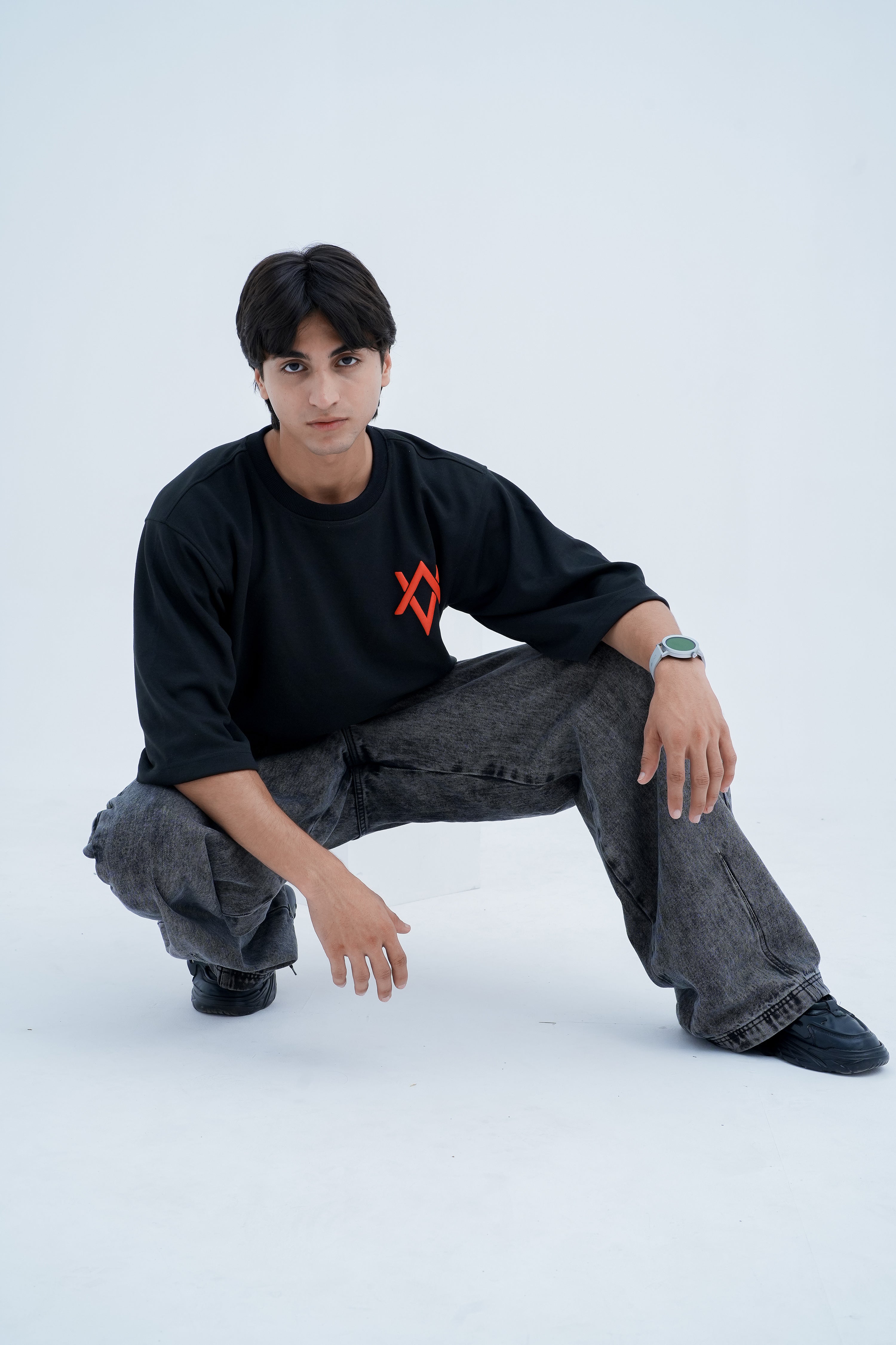 Mark Logo Tee - front pose crouched