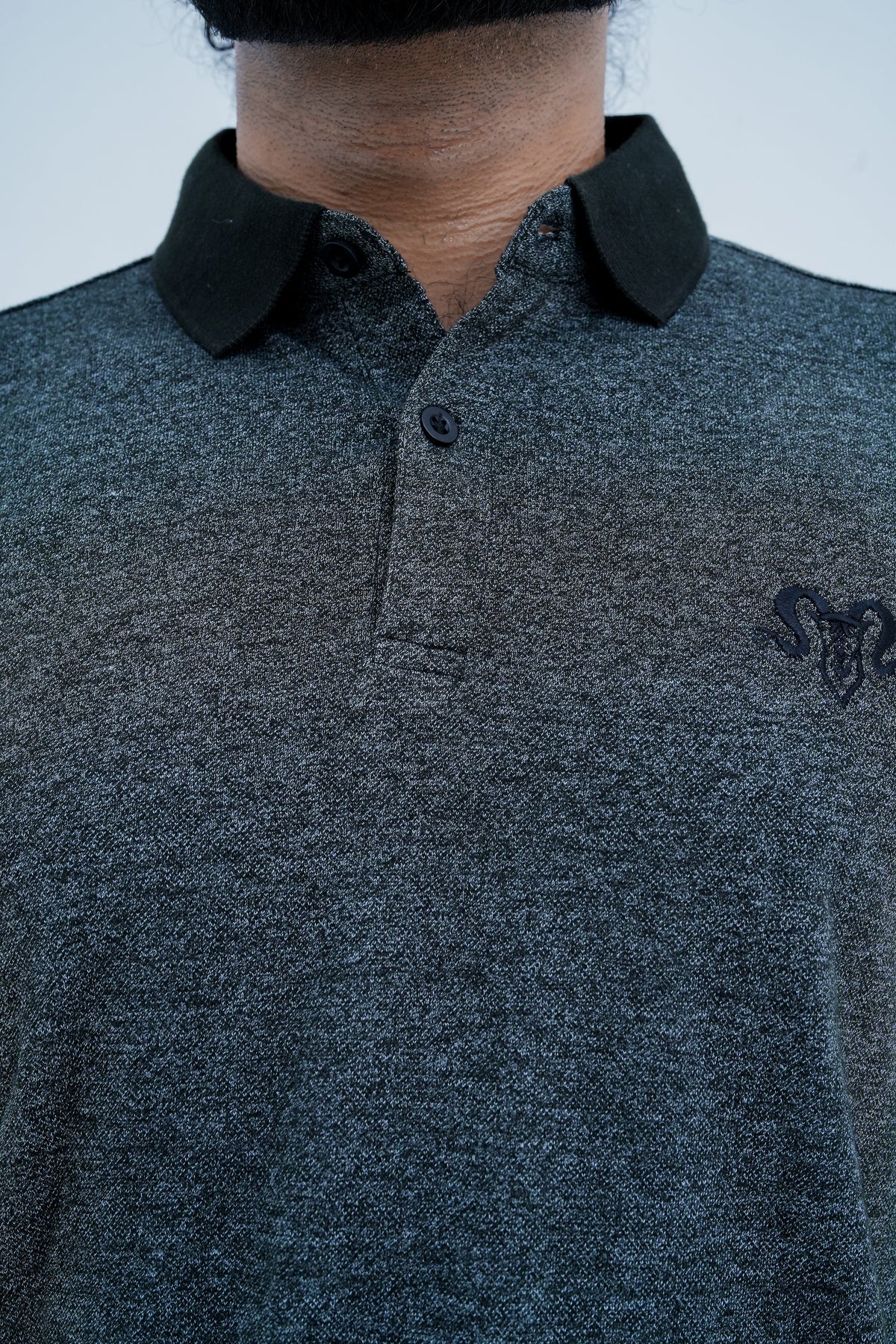 Onyx Contrast Polo - collar and chest emblem detail